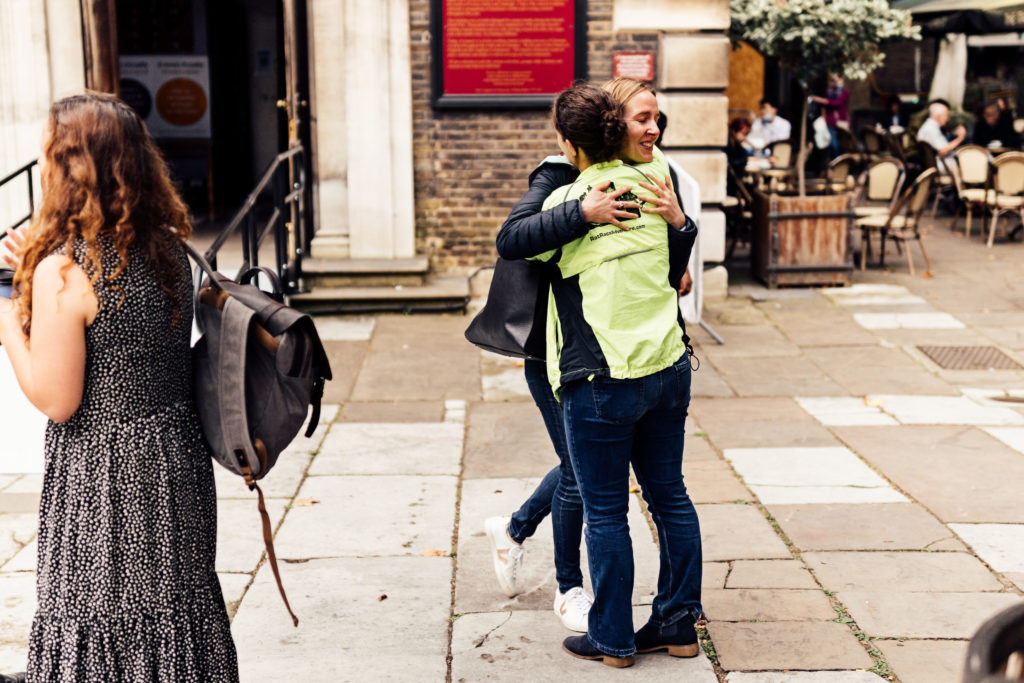 two woman embracing