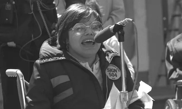 Judy Heumann pictured in in the 2020 Netflix documentary, Crip Camp. The pioneering camp for disabled childen was a formative experience for her. Photograph: HolLynn D’Lil/Netflix