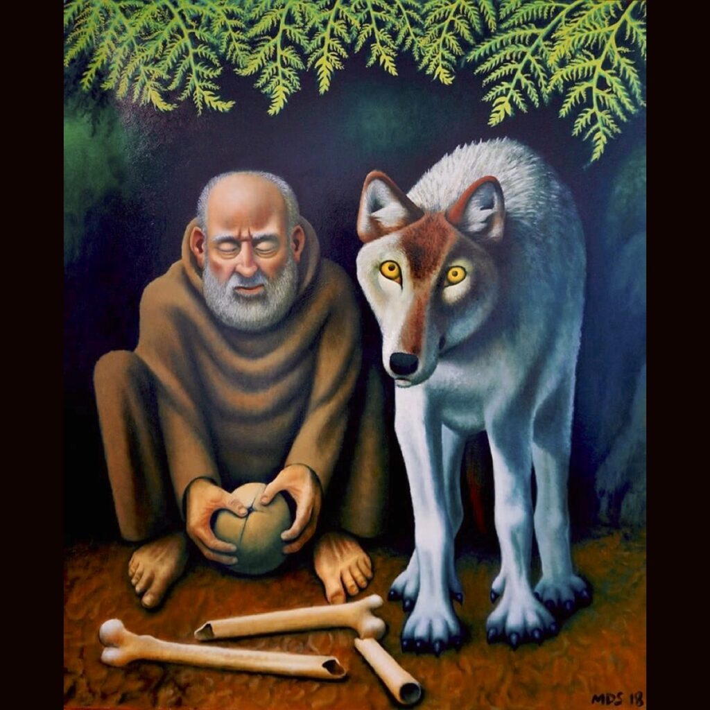 A modern painting of St Francis. He is sitting on the ground breaking a bread loaf open. Beside him is a wolf which looks directly at the viewer. There are bones on the ground before them.